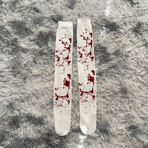 Red splatter knee high socks.